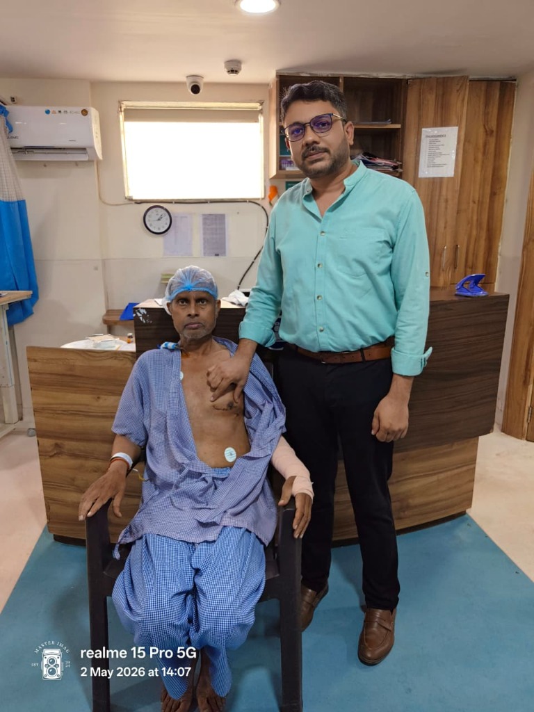 Dr. Vivek Ranjan Shrivastava with a patient